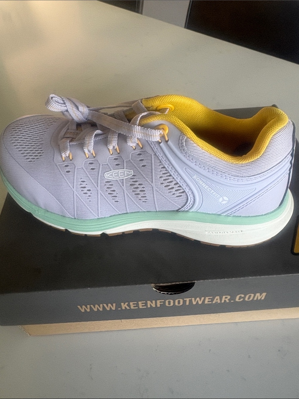 Keen Women's Light Lavender Athletic Shoe with Yellow Lining and Mint Midsole